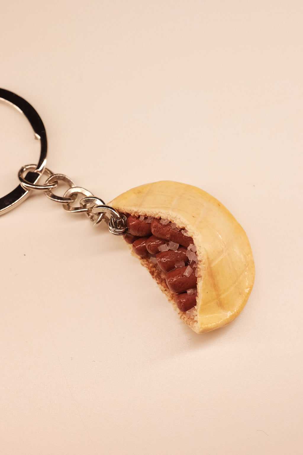 Deset u pola s lukom, privezak