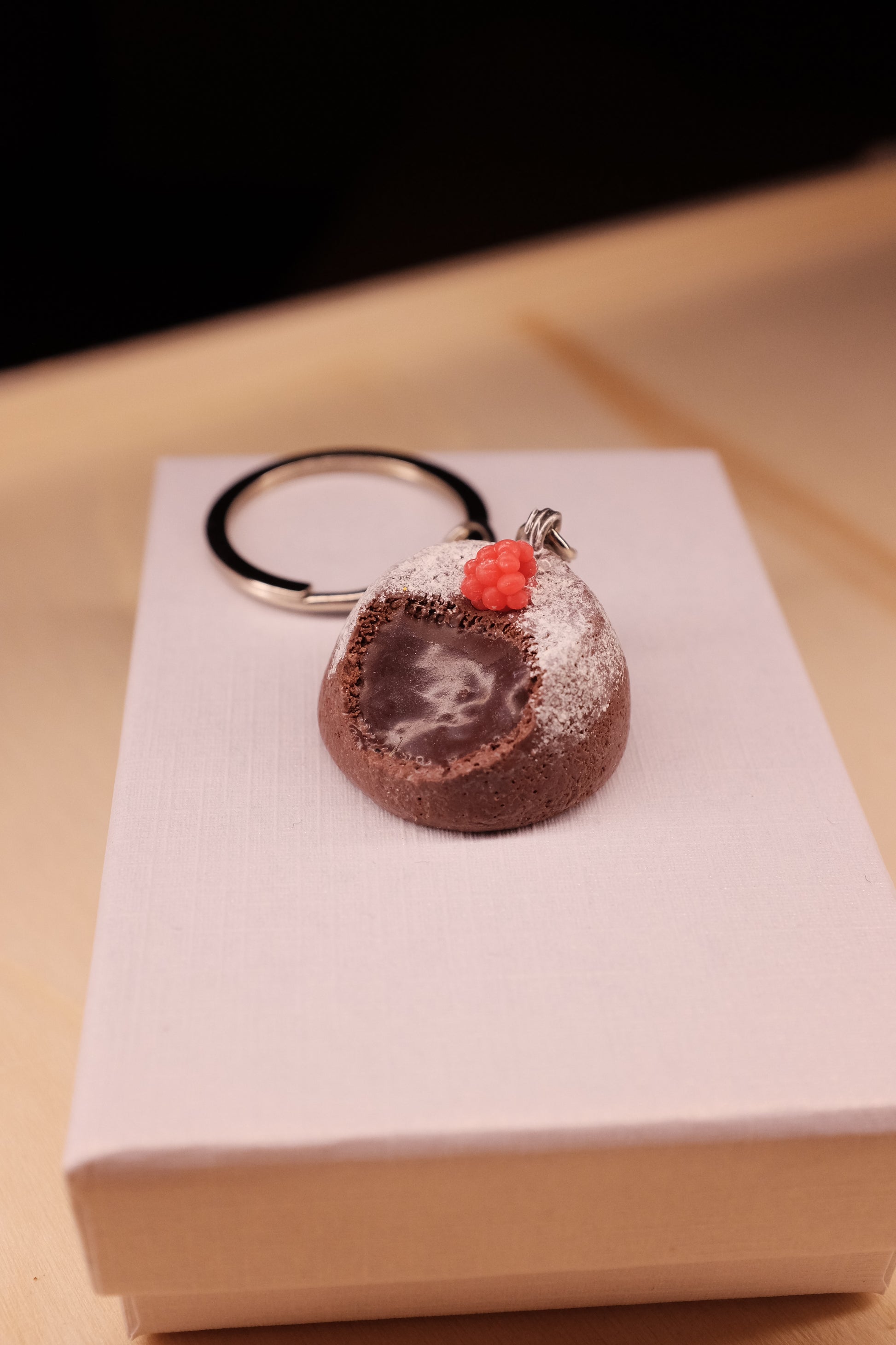 Lava cake with raspberry, keychain